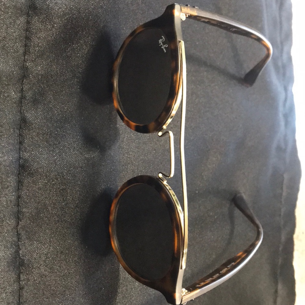 Ray Ban sunglasses with case.